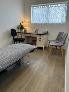 Interior of the therapy room at Holistic Individual Support Services, with a calm and welcoming setting for clients